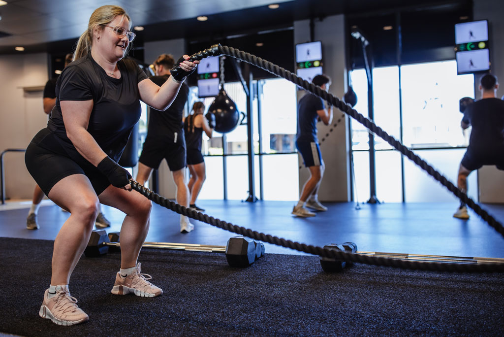 Group of people training at gym